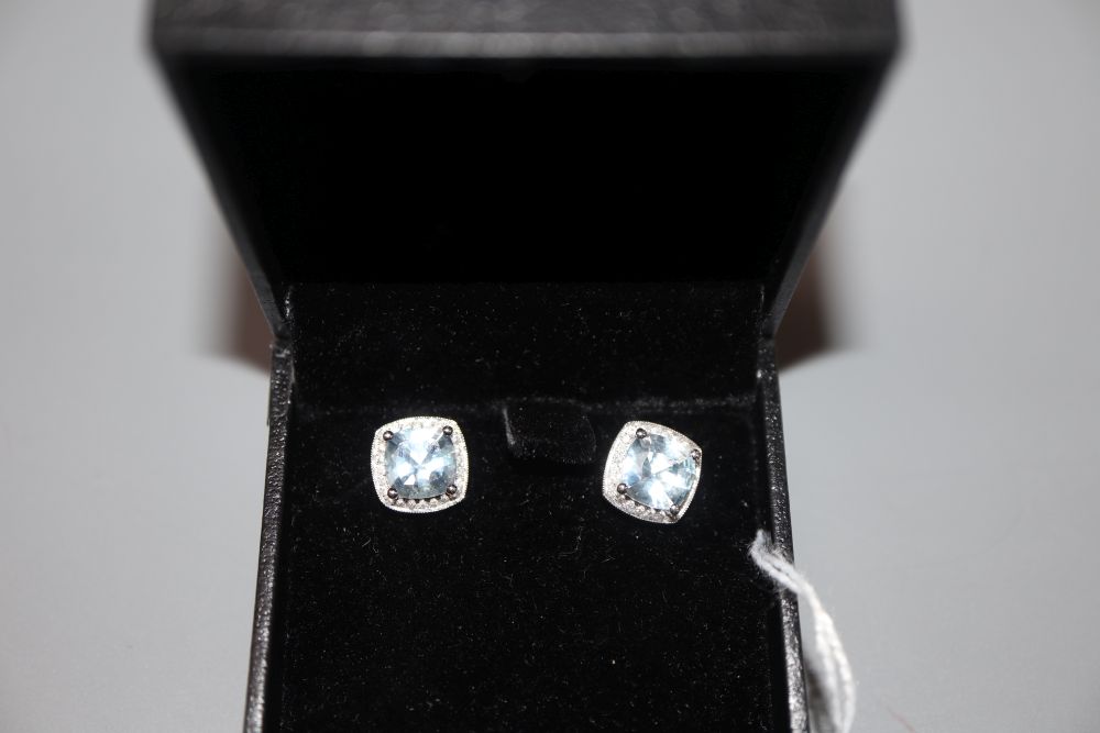 A pair of modern 14k white metal, aquamarine and diamond cluster ear studs, 10mm, gross 3 grams.